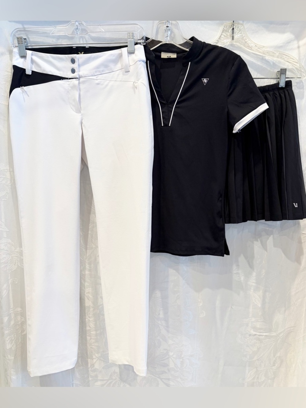 NEVERMINDALL White Pants XS $219 SWAN LOVE GOLF Black Top VUORI Black Skort XS